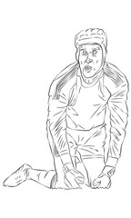 Deportista arrodillado en el campo de juego