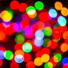 Multicolor lightbulb bokeh background, square