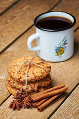 Metal cup, spices and cookies