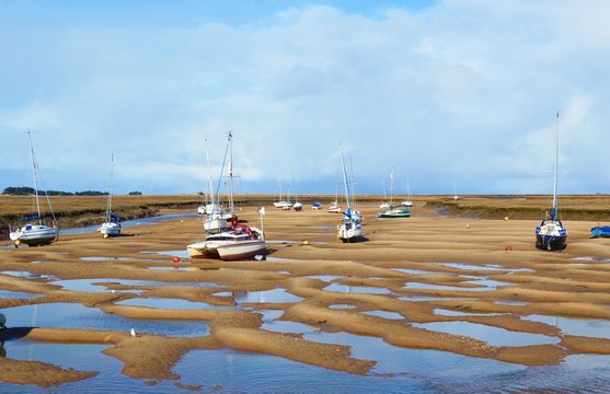 Boats at low tide on the North Norfolk coast.