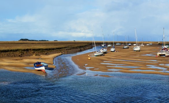 Boats At Low Tide On The North Norfolk Coast.