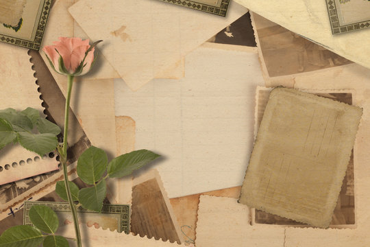 Old vintage archive with photos and pink roses