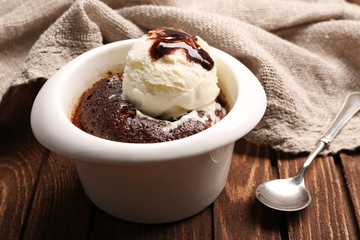 Served table of chocolate lava cake with ice-cream