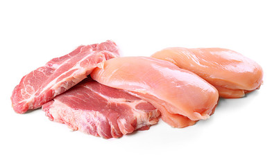 Pieces of pork and chicken meat, isolated on white