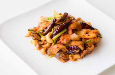 Closeup chicken with cashew nuts, rice dishes.