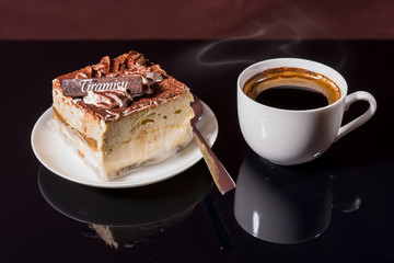 Cup of Coffee and Slice of Gourmet Tiramisu Cake