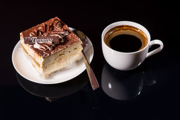 Cup of Coffee and Slice of Gourmet Tiramisu Cake