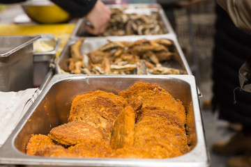 Golden Fried Patties in Tray at Buffet Table