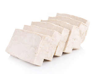 Tofu cubes on white background