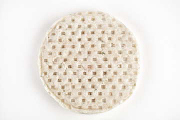 Frozen raw chicken meat over white background