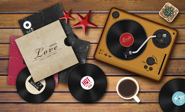 record player and vinyl record on wooden background