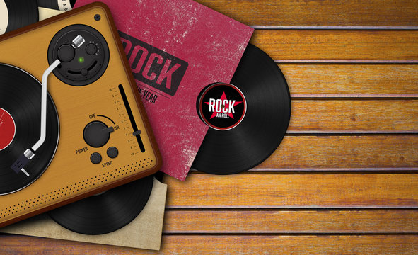 record player and vinyl record on wooden background