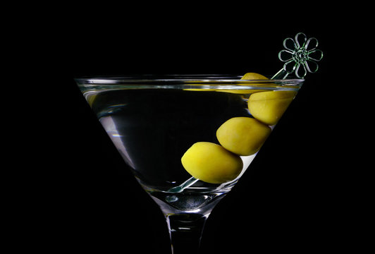 Martini cocktail with olives