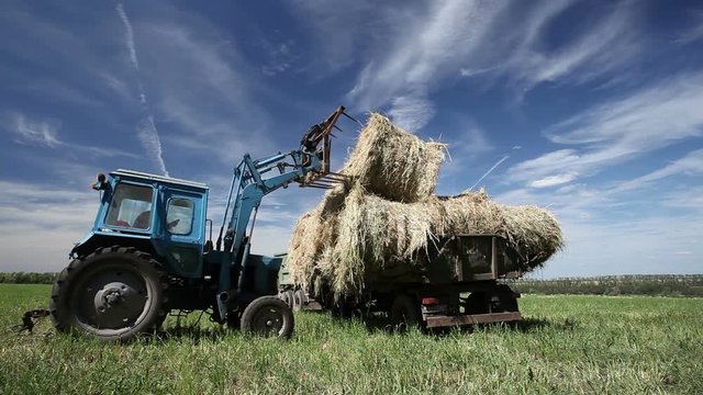 Pressing straw into ricks by baler