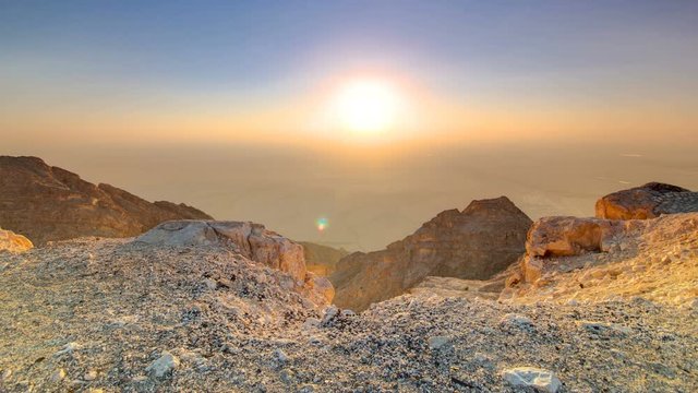 Sunset with rocks timelapse. Jebel Hafeet is a mountain located primarily in the environs of Al Ain and offers an impressive view over the city.