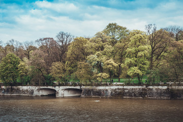 Tree lined promenade along meandering river