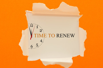 TIME TO RENEW message written under torn paper.