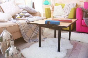 Modern living room design with sofa and armchairs