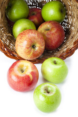 apples spilling out of basket
