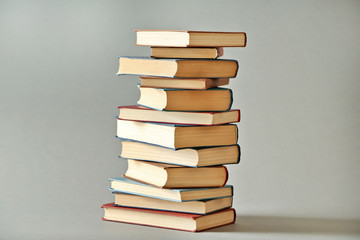 Stack of  books on grey background