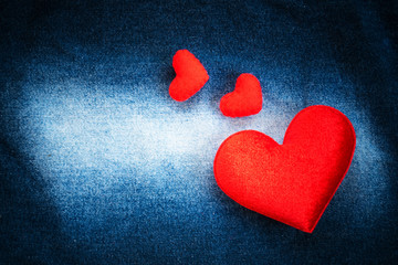texture of jeans and red heart shape for vintage background