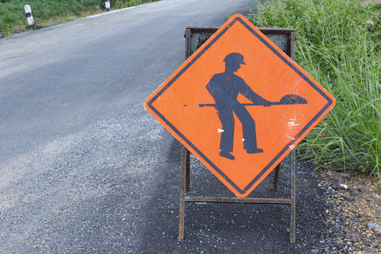 Under construction sign of damage road