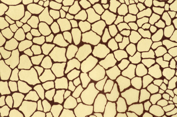Cream background with brown pattern - texture decorative colored paper  