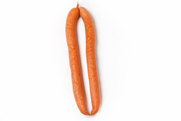 Thin smoked sausages isolated on white background