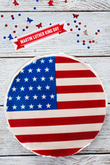 American flag cake, on wooden background. Martin Luther King day concept.