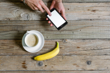 Hand touching mobile screen