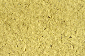 Yellow background - texture of decorative colored paper 