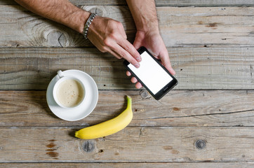 Hand touching mobile screen