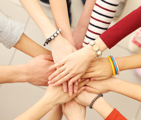 Group of people hands together