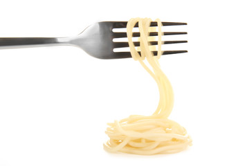 Spaghetti rolled on fork isolated on white