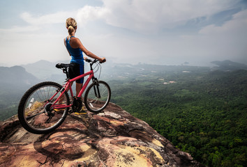 Fototapeta premium Young lady with Bicycle