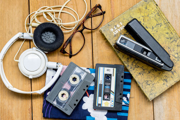 head phone cassette tape glasses diary and old  100 22mm. film c