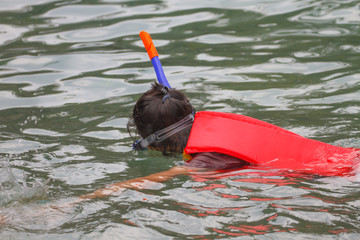 snorkeling in turquoise water