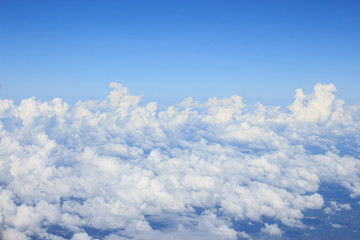 white cumulus clould and cloudscape on blue sky horizon background