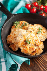 Grilled chicken meatballs on a skillet