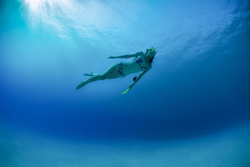 Fototapeta na wymiar Underwater shot of lady