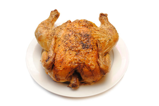 Whole Roasted Chicken on a Round White Platter