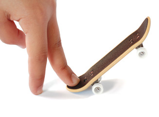 Fingers riding a skateboard, startup business concept