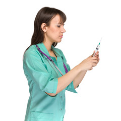 Doctor or nurse in lab coat holding syringe. Isolated over white.