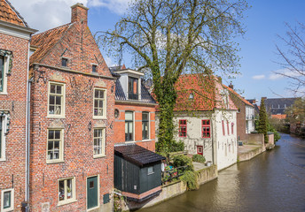 Old houses along a canal in Appingedam