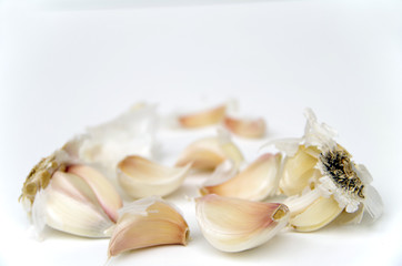 Garlic cloves in white background