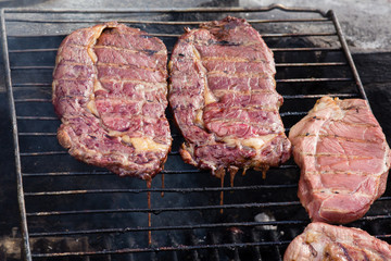 Outdoor grilled sirloin steaks