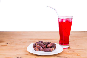 Sweet syrup, dates, simple iftar break fast food during Ramadan
