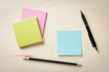 Sticky paper on wood desk
