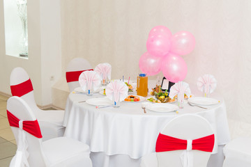 Dessert table with candy on a children's birthday. Celebratory children's table, the menu on the children's holiday