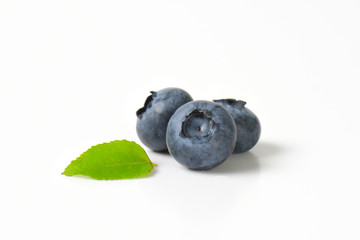 Three fresh blueberries